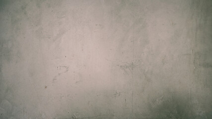 Grunge concrete wall texture with subtle cracks and stains for background use