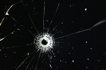 Bullet holes on black glass, overlay design background