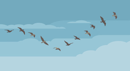 Flock of migratory birds flying in V formation in the sky.