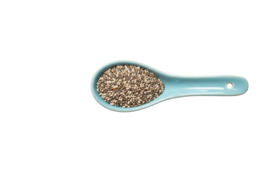 Isolated turquoise spoon containing chia seeds, a nutrient dense superfood for good health.