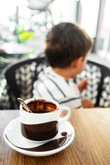 Child Drinking a Delicious Cup of Hot Chocolate