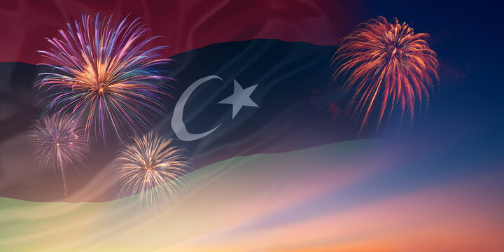Waving National flags of Libya In sky with fireworks and text