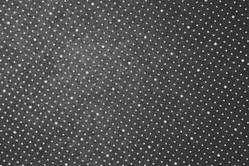 White polka dots on gray background. Polka dots wallpaper