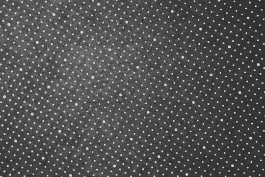 White polka dots on gray background. Polka dots wallpaper