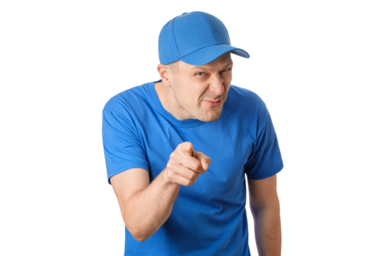 Man in blue shirt and cap points and looks confident with a playful expression in a bright setting
