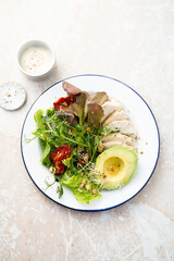 Green salad with chicken and avocado	
