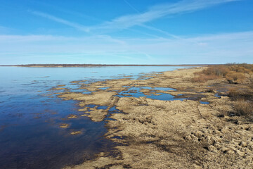Aerial photography of a lake drought, climate change landscape, drying up reservoir, aerial view, environmental problem