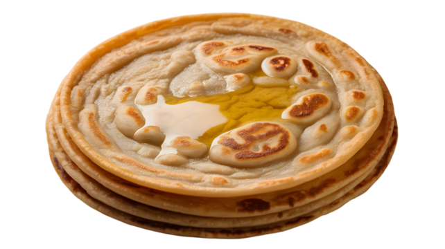 Stack of paratha flatbreads drizzled with ghee close up on transparent background