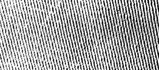 Bold diagonal denim fabric texture with rough twill weave and deep black-and-white contrast on a transparent background.