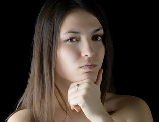 Thoughtful woman contemplating life decisions.