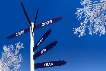 Happy new year 2026 on direction signs, snowy trees, winter greetings © Delphotostock