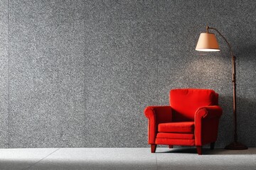 Red armchair and lamp stand against a textured gray wall.