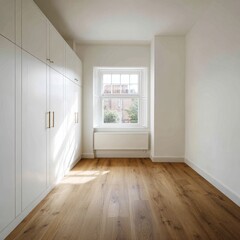 Obraz premium Empty bedroom with white walls laminate flooring and fitted wardrobe