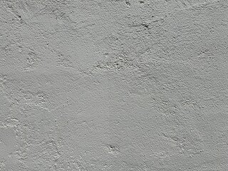Light Gray plaster wall texture with subtle relief and natural imperfections. Neutral surface for backgrounds, mock-ups, and architectural design projects.