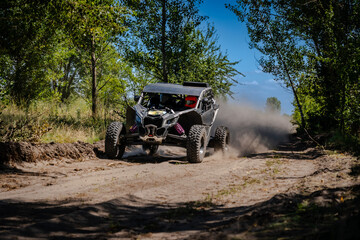Cool view on UTV, 4x4 off-road vehicle in summer. Amateur competitions © Antonio