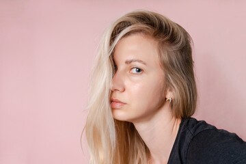 Fototapeta premium Portrait of elegant woman. Attractive sensual young blond woman. Nude makeup, nomakeup