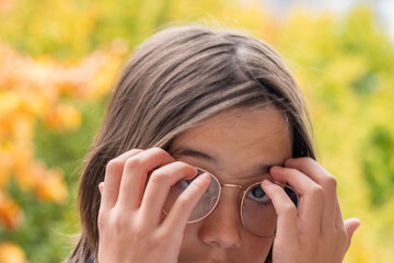 Close-up portrait teenage boy touching head with pain, suffering from headache or concussion, childhood trauma, stress, and health problems, Teen health and recovery, Pain and emotional struggle
