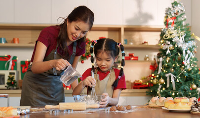 Family Baking: Mother and Daughter Creating Holiday Treats Together