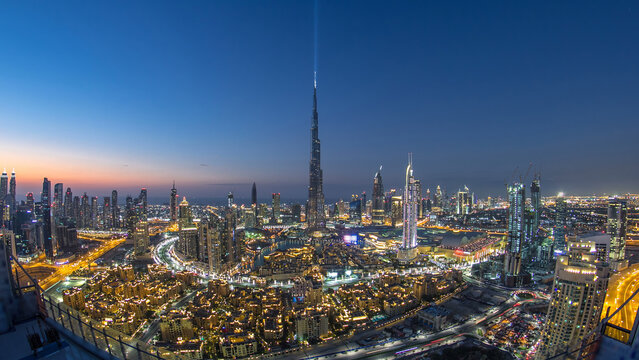 Dubai Downtown day to night timelapse view from the top in Dubai, United Arab Emirates