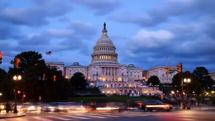 Architectural time-lapse video of the US Capitol, Washington D.C., at dawn/dusk with indigo-golden sky, car light trails on wet asphalt. Grand passage of time concept - Powered by Adobe