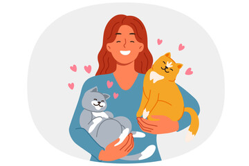 Woman with two cats in arms loves own pets found in shelter with homeless animals. Girl holding affectionate cats, enjoying opportunity to raise kittens and inviting you to visit veterinary store