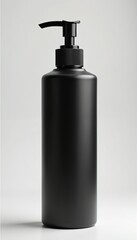 Fototapeta premium Matte black empty pump bottle stands on plain white background. Cosmetic liquid soap dispenser for personal care. Vertical container refillable, good for shampoo, shower gel, body lotion, skincare.