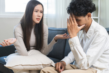 Obraz premium Breakup and depressed, asian young quarrel couple love fight relationship in trouble. Different people are emotion angry. Argue wife has expression upset with husband. Problem of family people.