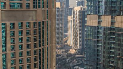 Obraz premium Dubai skyline with skyscrapers timelapse at Dubai Marina from above.