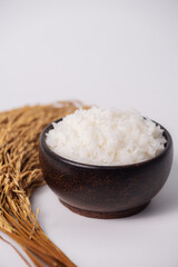 White rice in wooden bowl on white background, Rice from asia, Rice food of asian style