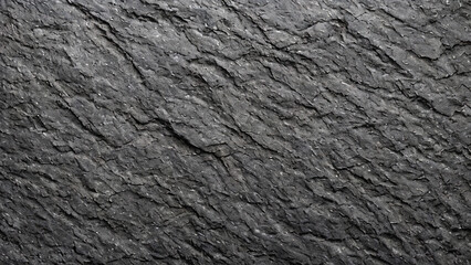 粗いグレーの岩肌に細かなひび割れと凹凸が広がり、
サイドからの柔らかな光が陰影を生み出して立体感を強調しています。
自然の質感や素材感を際立たせる、落ち着いたモノトーンの構図。