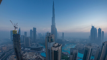 Naklejka premium Foggy morning in downtown of Dubai night to day timelapse.