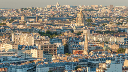 Obraz premium Aerial panorama above many houses rooftops in a Paris timelapse