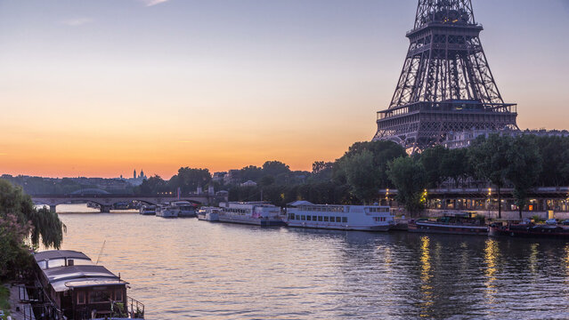 Eiffel Tower and the Seine river night to day timelapse, Paris, France