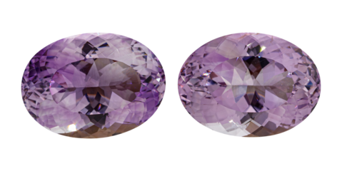 Twin amethyst gemstones with oval cuts, featuring deep purple hues and sparkling facets. Perfect for unique jewelry with vibrant c