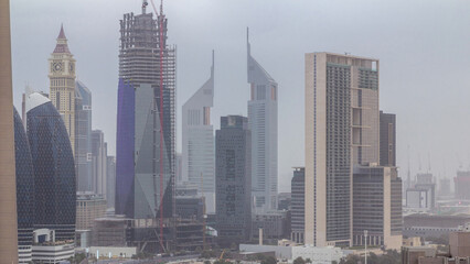 Dubai downtown skyline at morning aerial timelapse with traffic on highway