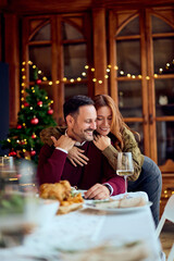 Romantic Couple Celebrates Christmas Dinner At Home With Cozy Holiday Warmth