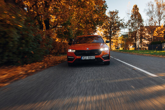 2023 Skoda Octavia RS go fast at the highway during sunset