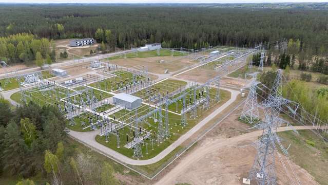 Aerial View of Electrical Substation in Forested Area