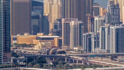 Dubai Marina skyscrapers and golf course morning timelapse, Dubai, United Arab Emirates