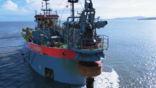 Dredge ship at sea removing sediment and sand from the seabed for dredging the Santa Catarina coast.