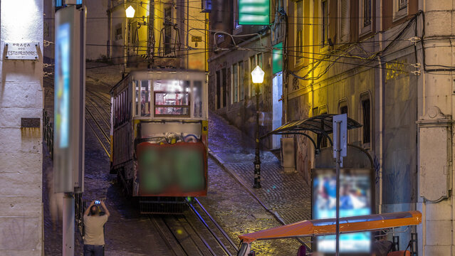 Lisbon's Gloria funicular day to night timelapse located on the west side of the Avenida da Liberdade