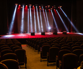 A spotlight on an empty stage.