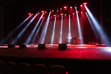 A spotlight on an empty stage.