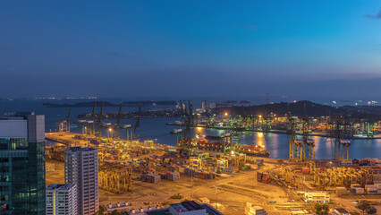 Naklejka premium Commercial port of Singapore aerial day to night timelapse.