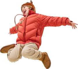 Excited boy in red jacket jumping mid-air with open arms and joyful face on transparent background. Concept of dynamic childhood movement, happiness, and stylish kids winter outerwear.