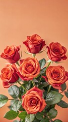 Obraz premium Vibrant red roses with green leaves in a lush garden setting