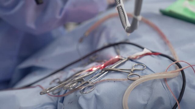 A surgeon performs tympanoplasty surgery on a patient to help him hear