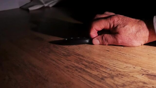 Finding lost keys by torchlight in a dark room