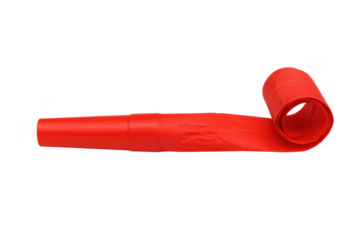 Red party blower extending, celebrating birthdays, new year's eve, or special events, creating joyful noise