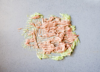 Glossy liquid foundation texture reflecting gentle highlights. A symbol of purity and sophistication.